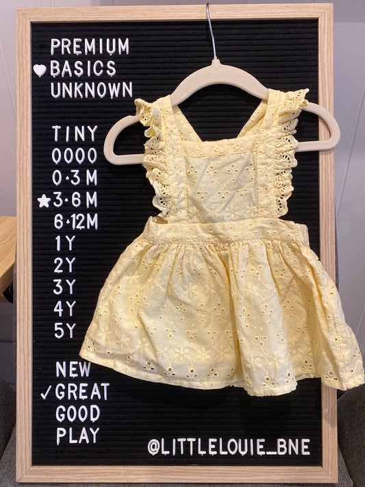 Yellow broderie anglaise ruffle dress pinafore