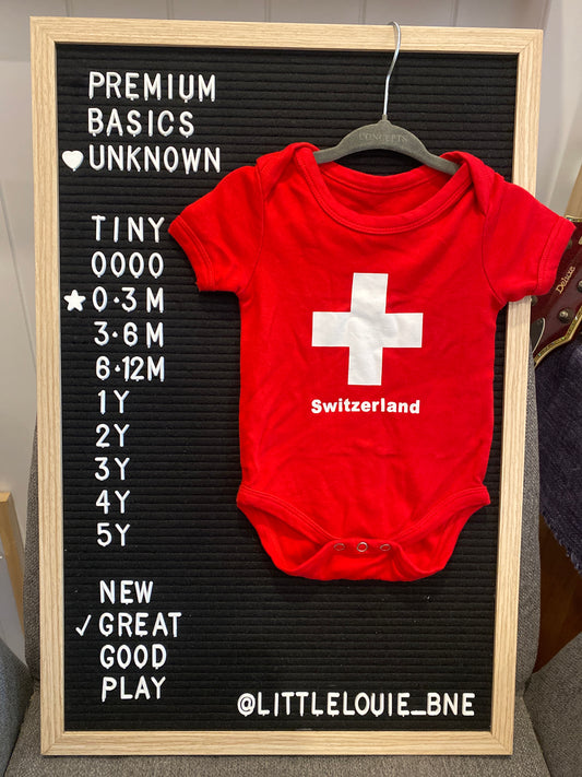 Red ‘Switzerland’ short sleeved onesie