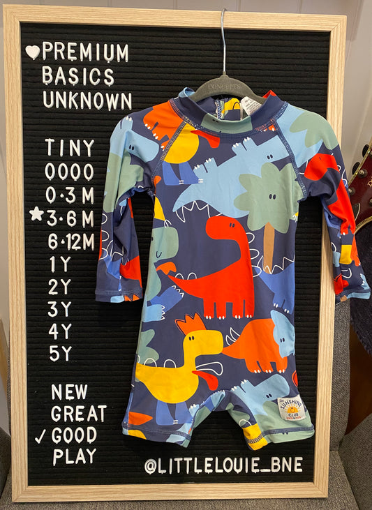 Long sleeved swimsuit with dinosaur print